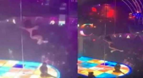 கம்பியின் உச்சியில் நின்று கவர்ச்சி நடனமாடிய இளம்பெண்! எதிர்பாராமல் கீழே விழுந்த அதிர்ச்சி! வைரலாகும் வீடியோ!!