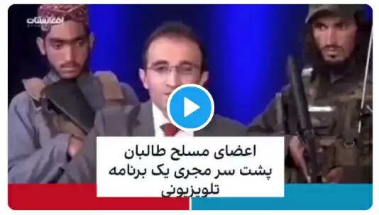 துப்பாக்கி முனையில் செய்தி வாசிப்பாளர்...!! துப்பாக்கி முனையில் செய்தி வாசிப்பாளர்...!!