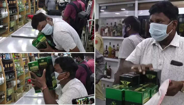 புதுவையில் 40 நாட்களுக்கு பிறகு மதுக்கடைகள் திறப்பு... மதுபானங்களை கட்டியனைத்து முத்தம் கொடுத்த குடிமகன்!!