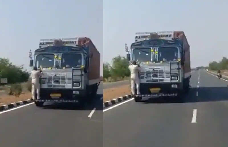 அதிர்ச்சி! டோல்கேட் ஊழியரை பம்பரில் தொங்கவிட்ட லாரி ஓட்டுநர்!! VIDEO