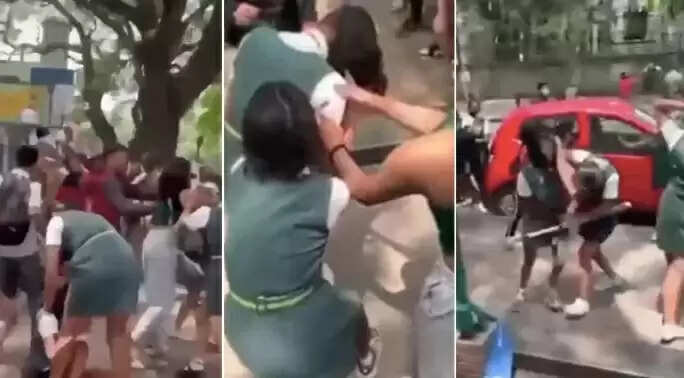 காதலனுக்காக சாலையில் கட்டி உருண்டு பள்ளி மாணவிகள் மோதல்.. வைரலாகும் வீடியோ !!