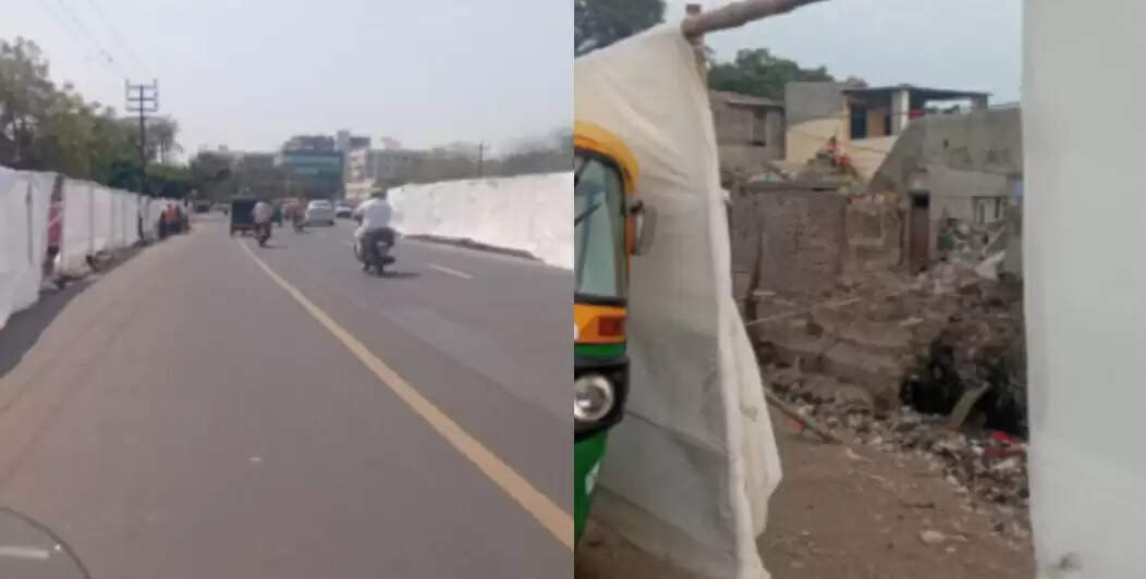 இது தான் குஜராத் மாடலா ? - பிரிட்டன் பிரதமர் கண்ணில் படாமல் இருக்க குடிசைகளை மறைத்த அரசு !